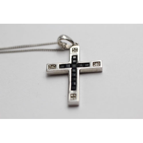 2041 - A 9ct white gold diamond and sapphire cross pendant necklace - approx. gross weight 4.5g