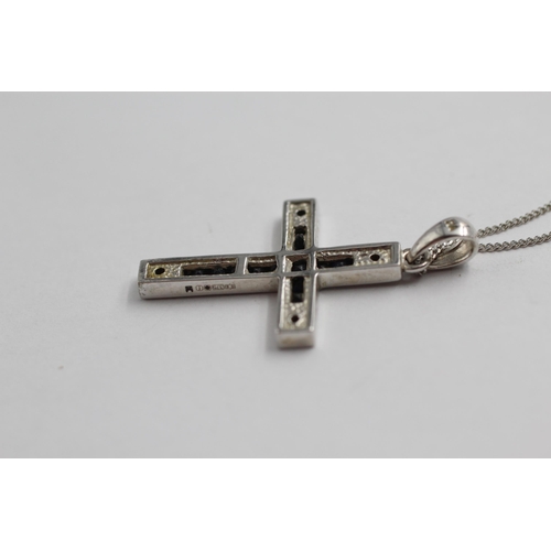 2041 - A 9ct white gold diamond and sapphire cross pendant necklace - approx. gross weight 4.5g