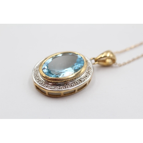 2047 - A 9ct gold diamond and topaz halo pendant necklace - approx. gross weight 4.5g