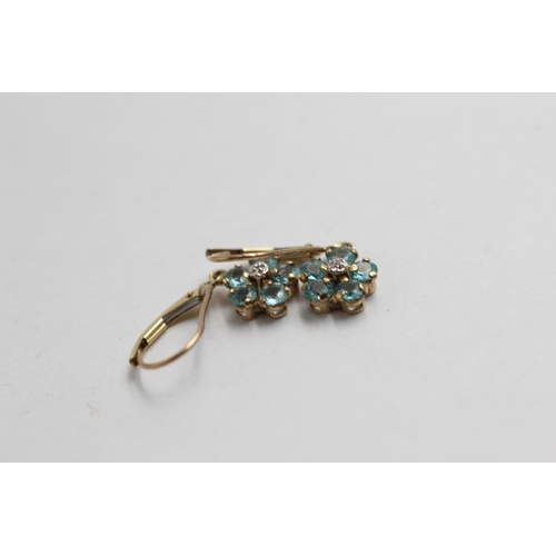 2049 - A 9ct gold blue gemstone and diamond ring and earrings set - approx. gross weight 4.9g