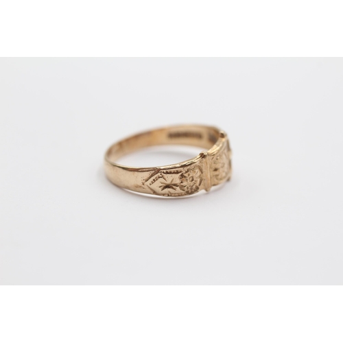 2052 - A 9ct gold buckle ring - approx. gross weight 2.3g