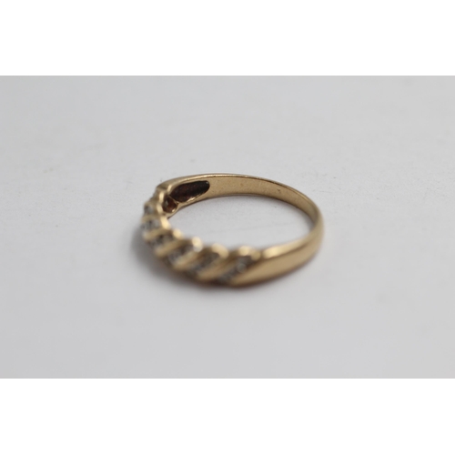 2057 - A 9ct gold diamond stylised half-eternity dress ring - approx. gross weight 2.3g