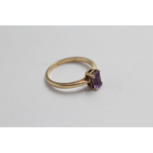 2059 - A 9ct gold amethyst solitaire dress ring - approx. gross weight 1.9g