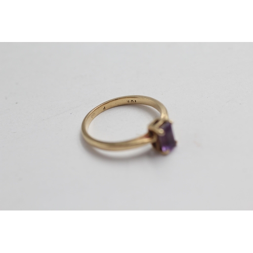 2059 - A 9ct gold amethyst solitaire dress ring - approx. gross weight 1.9g