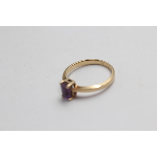 2059 - A 9ct gold amethyst solitaire dress ring - approx. gross weight 1.9g