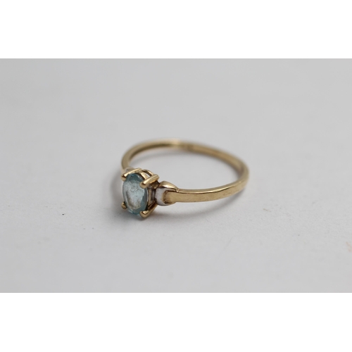 2062 - A 9ct gold blue topaz solitaire ring - approx. gross weight 0.9g