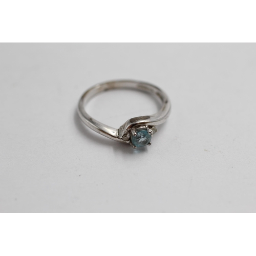 2073 - Three 9ct white gold blue topaz and diamond stacking rings, size N - approx. gross weight 5.4g