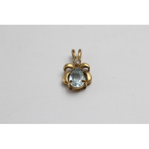 2076 - Four 9ct gold gemstone pendants to include garnet and diamond, sapphire and diamond, topaz etc. - ap... 