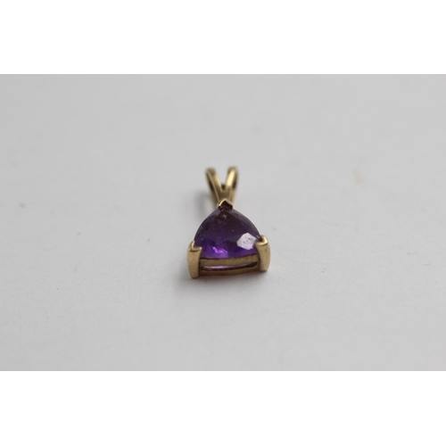 2077 - Three 9ct gold gemstone amethyst pendants, one with diamond - approx. gross weight 1.8g