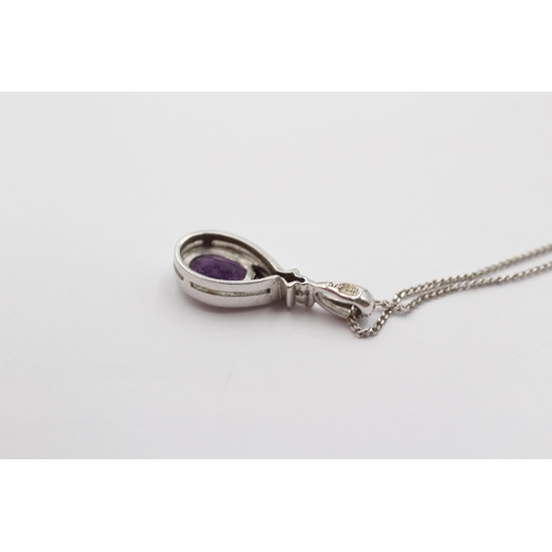 2082 - A 9ct white gold diamond and amethyst twist drop pendant necklace - approx. gross weight 1.5g