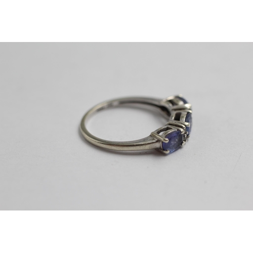 2096 - A TGGC 9ct white gold tanzanite and diamond ring - approx. gross weight 2.1g