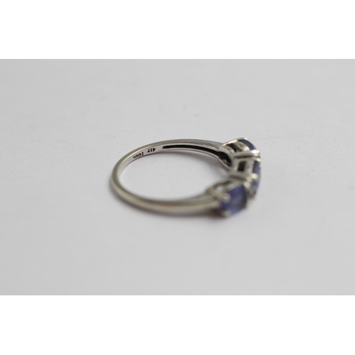 2096 - A TGGC 9ct white gold tanzanite and diamond ring - approx. gross weight 2.1g