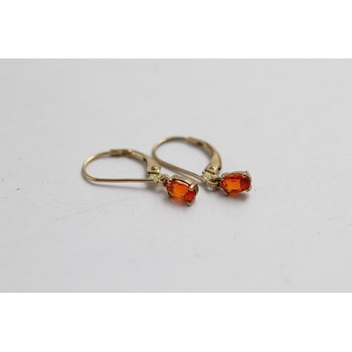 2100 - Two pairs of 9ct gold gemstone drop earrings - approx. gross weight 2.4g