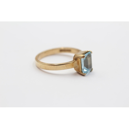 2103 - A 9ct gold blue topaz solitaire ring - approx. gross weight 2.9g