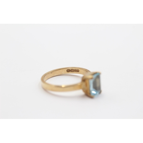 2103 - A 9ct gold blue topaz solitaire ring - approx. gross weight 2.9g