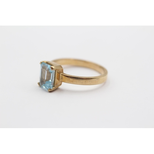 2103 - A 9ct gold blue topaz solitaire ring - approx. gross weight 2.9g