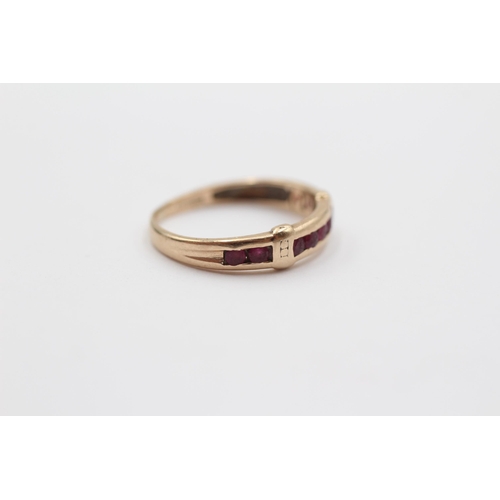 2107 - A 9ct gold ruby channel set ring - approx. gross weight 1.3g