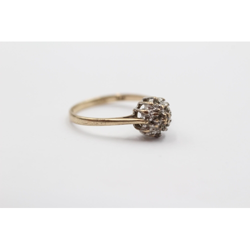 2123 - A 9ct gold diamond cluster ring - approx. gross weight 1.5g