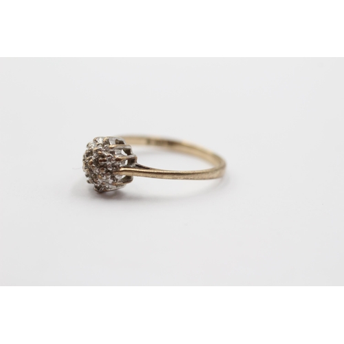 2123 - A 9ct gold diamond cluster ring - approx. gross weight 1.5g