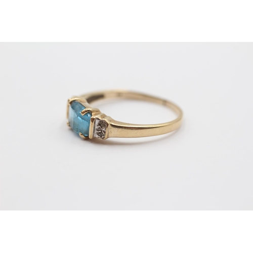 2127 - A 9ct gold blue topaz and diamond five stone dress ring - approx. gross weight 2g