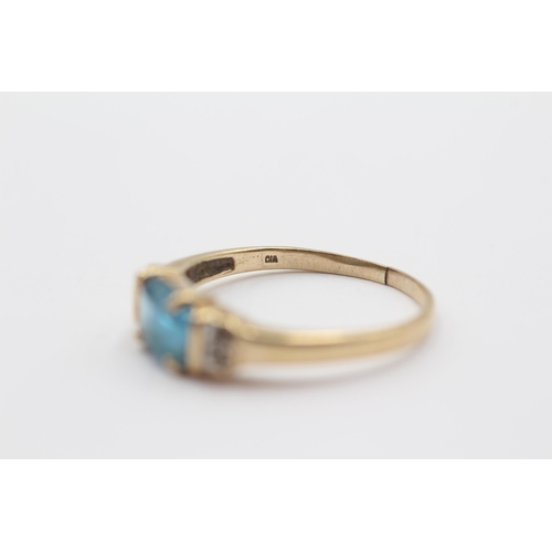 2127 - A 9ct gold blue topaz and diamond five stone dress ring - approx. gross weight 2g