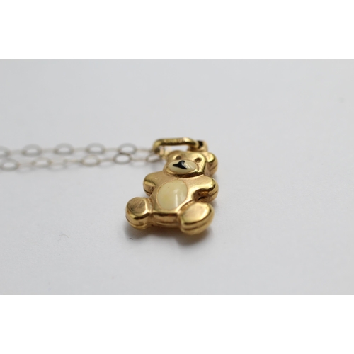 2129 - A 9ct gold enamel teddy bear pendant necklace - approx. gross weight 1.3g