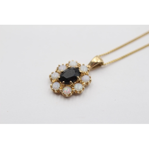 2130 - A 9ct gold sapphire and opal halo pendant necklace - approx. gross weight 2.8g