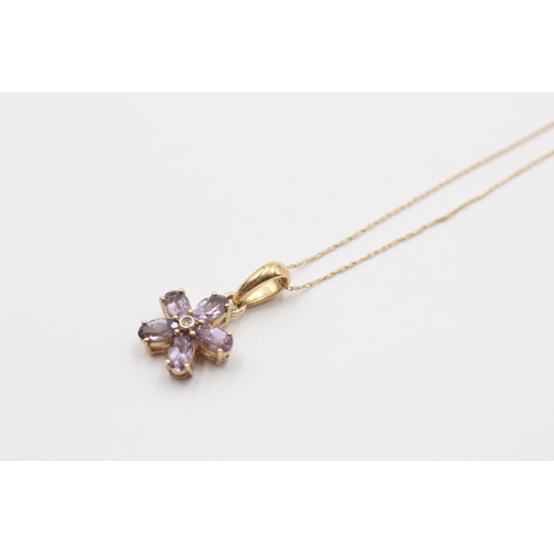 2134 - A 9ct gold tanzanite and diamond floral pendant necklace - approx. gross weight 1.9g