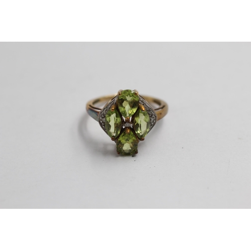 2137 - A 9ct gold peridot and diamond cluster statement ring - approx. gross weight 3g