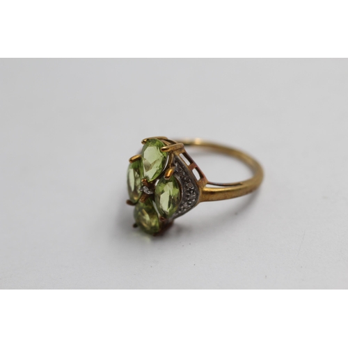 2137 - A 9ct gold peridot and diamond cluster statement ring - approx. gross weight 3g