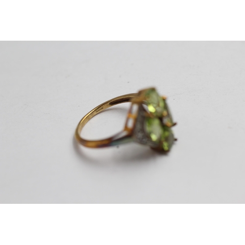 2137 - A 9ct gold peridot and diamond cluster statement ring - approx. gross weight 3g