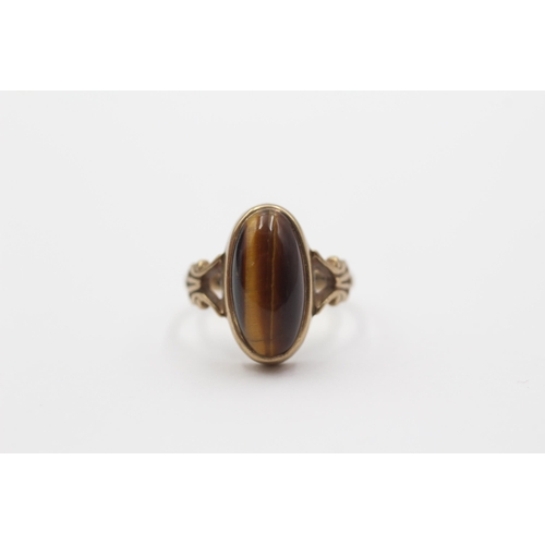 2139 - A 9ct gold tiger's eye cocktail ring - approx. gross weight 3g