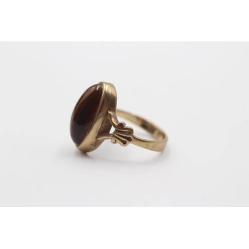 2139 - A 9ct gold tiger's eye cocktail ring - approx. gross weight 3g