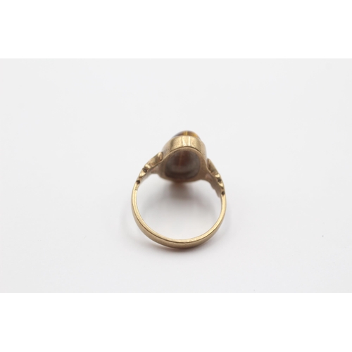 2139 - A 9ct gold tiger's eye cocktail ring - approx. gross weight 3g