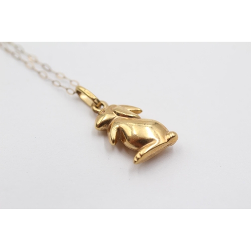 2141 - A 9ct gold rabbit pendant necklace - approx. gross weight 1g