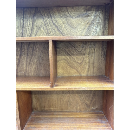 76 - A teak bookcase