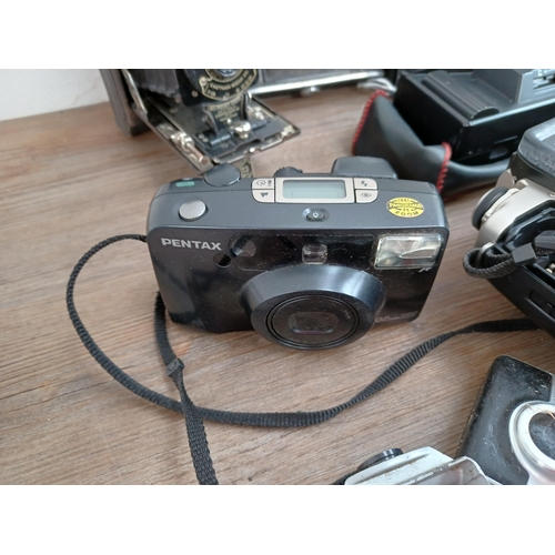 509 - A collection of cameras for spares or repair