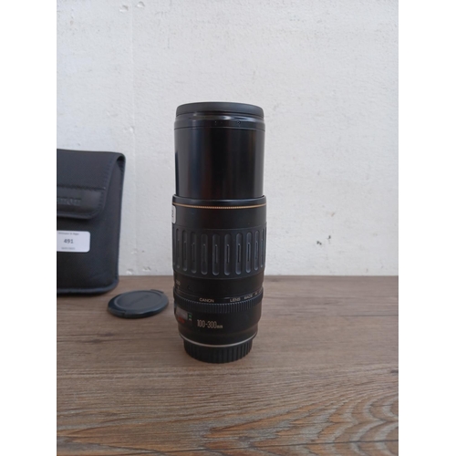 491 - A cased Canon Ultrasonic EF 1:4.5-5.6 100-300mm zoom lens