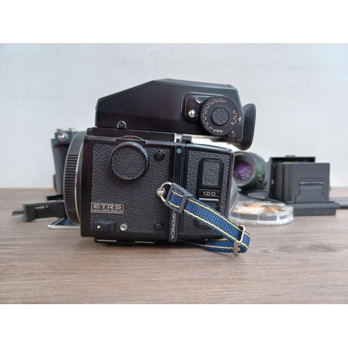 497 - Two cameras, one Zenza Bronica ETRS 4.5x6 medium format leaf shutter SLR with 120 film back, Zenzano... 