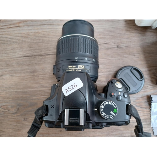 498 - A Nikon D3200 DSLR camera fitted with Nikkor AF-S DX 1:3.5-5.6G VR 18-55mm lens with charger, instru... 