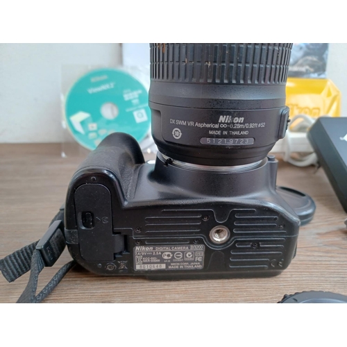 498 - A Nikon D3200 DSLR camera fitted with Nikkor AF-S DX 1:3.5-5.6G VR 18-55mm lens with charger, instru... 