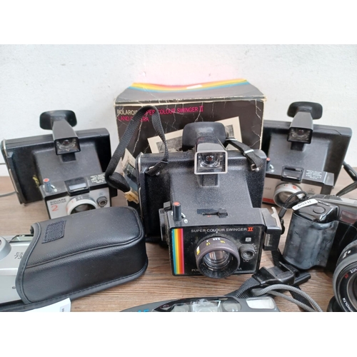 499 - Seven cameras to include Minolta Dynax 5000i 35mm SLR, cased Pentax Espio 738G 35mm compact with ins... 