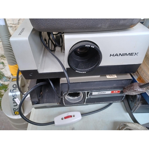 505 - A very large quantity of projectors and cine cameras to include Bell & Howell Lumina 1.2 8mm, Hanime... 