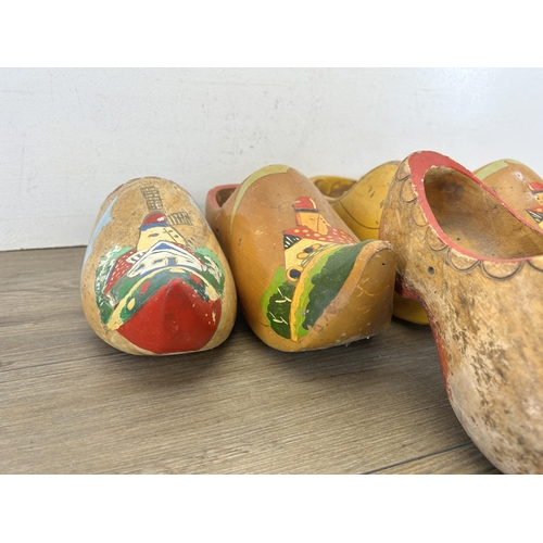 429 - Five hand painted wooden clogs