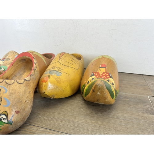 429 - Five hand painted wooden clogs