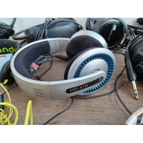 515 - A collection of headphones to include Sennheiser HD415, AKG K44, Skullcandy, Philips SBC487 etc.