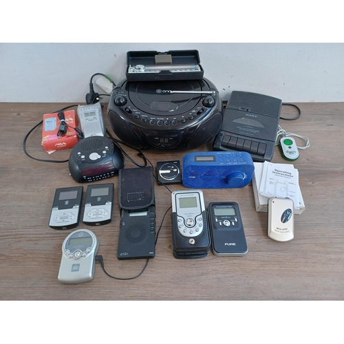 516 - A collection of radios, CD players and cassette recorders to include two Majority pocket DAB, cased ... 