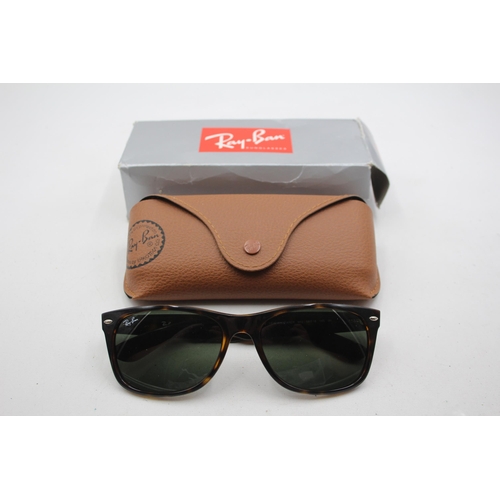 2382 - A pair of Ray-Ban Wayfarer brown tortoishell sunglasses with original case