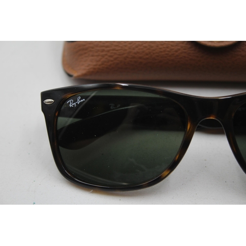 2382 - A pair of Ray-Ban Wayfarer brown tortoishell sunglasses with original case