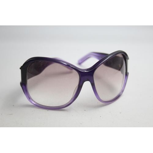 2383 - A pair of Gucci purple framed sunglasses with original case